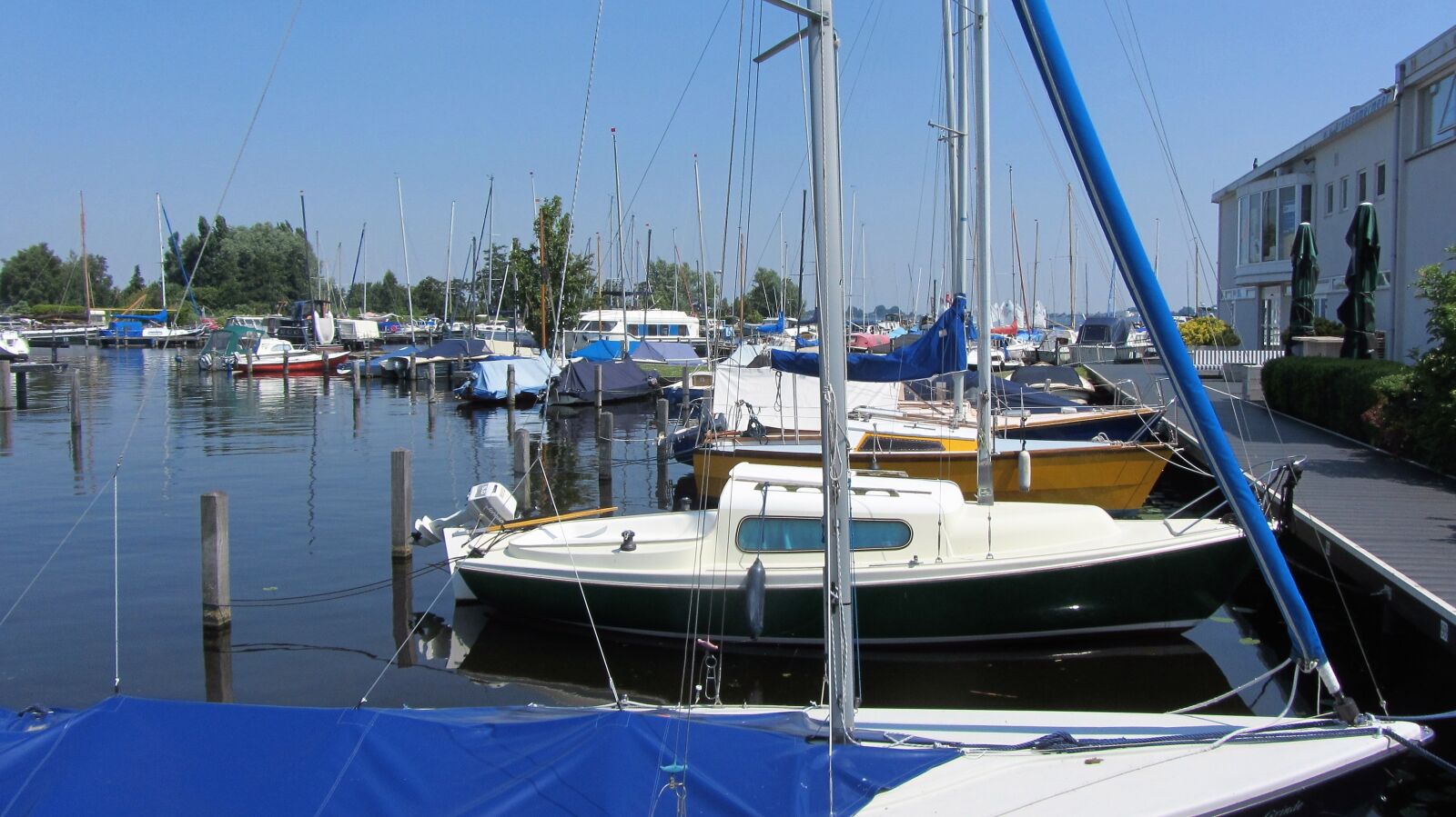 Canon PowerShot SX220 HS sample photo. Sailing boat, marina, port photography