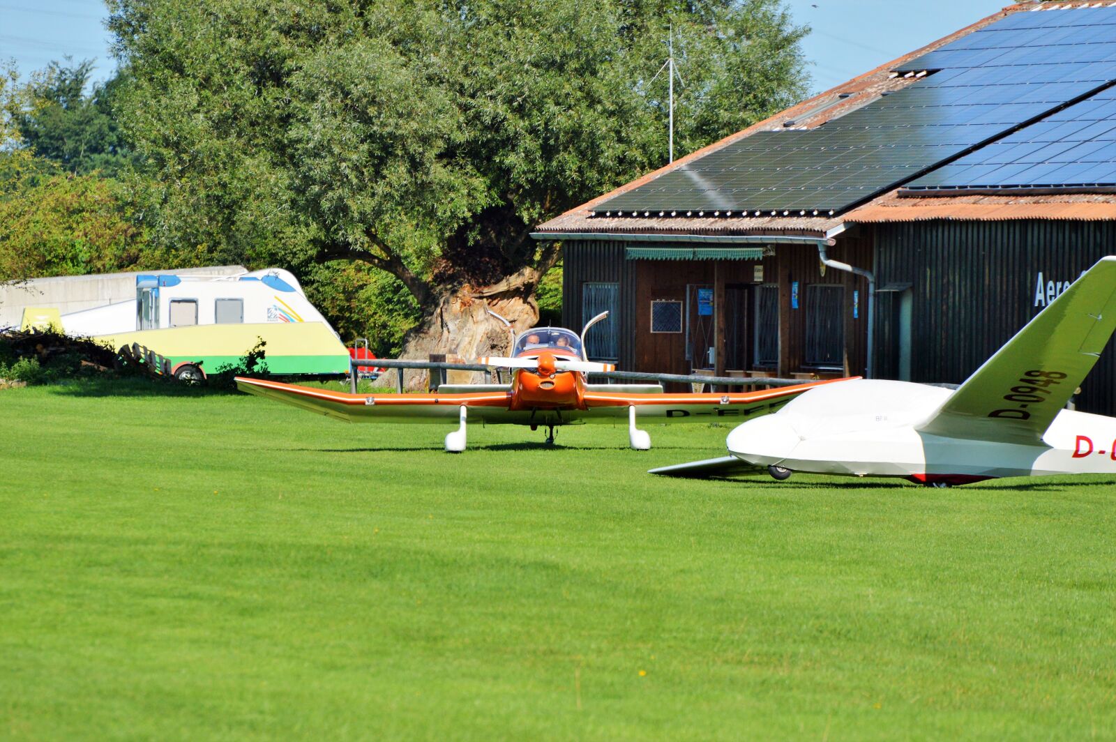 Nikon D3200 sample photo. Aircraft, airport, propeller plane photography