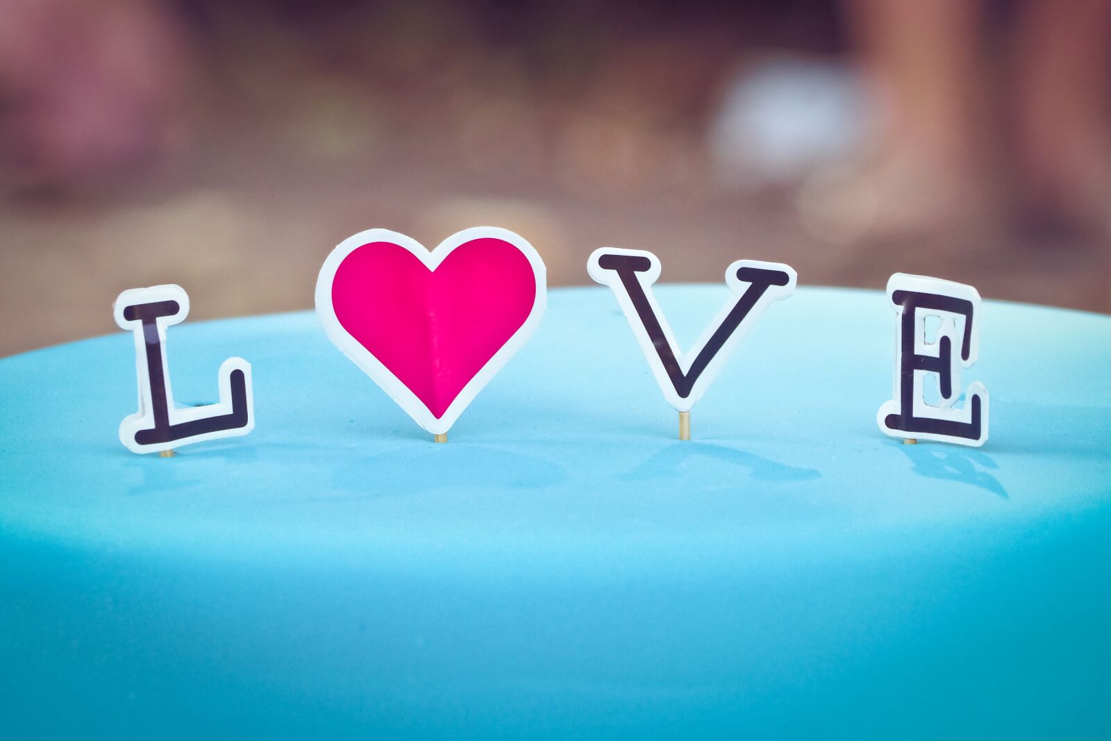 Olympus OM-D E-M10 sample photo. Cake, love, letters photography