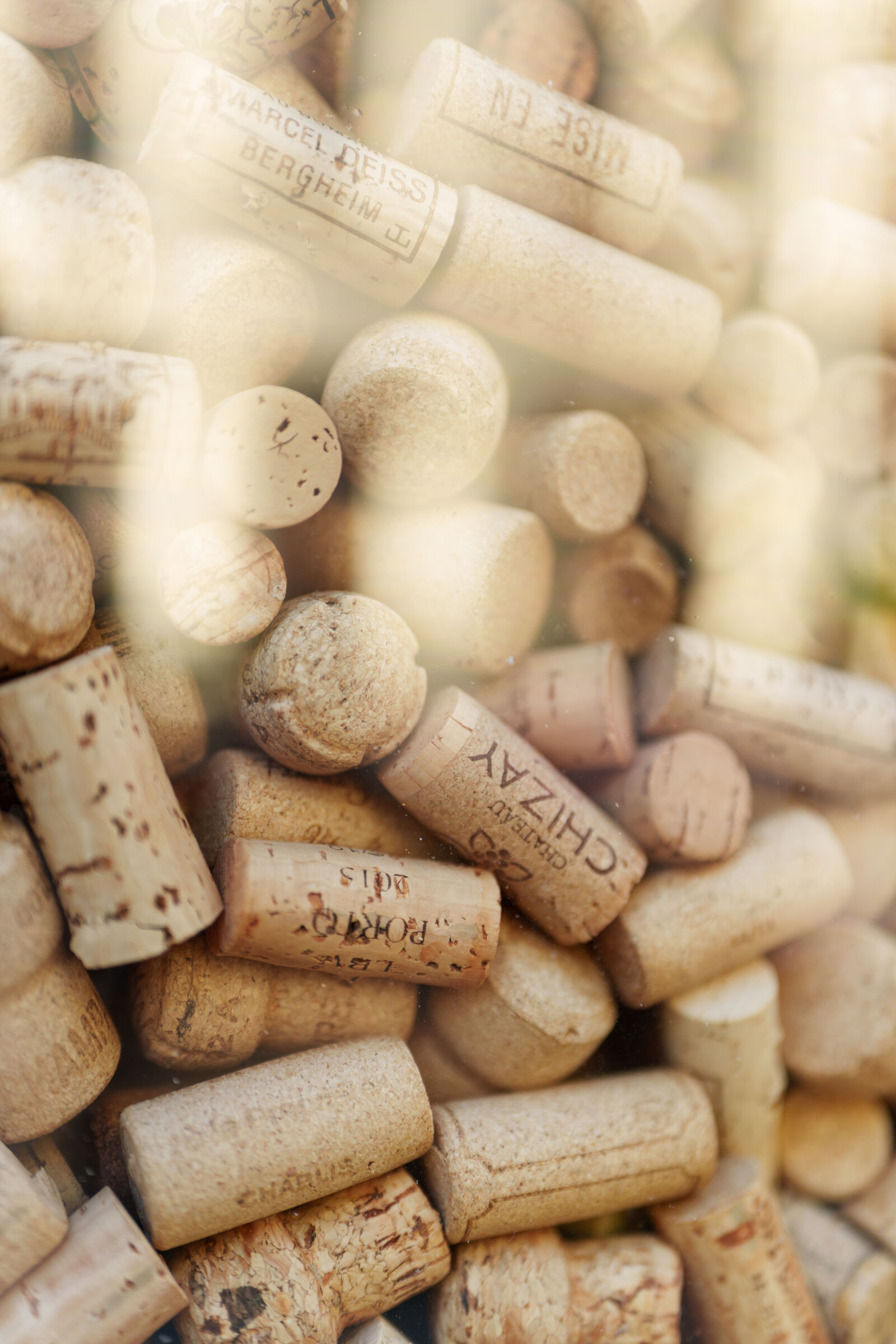 Sigma 28-45mm F1.8 DG DN Art sample photo. Wine bottle caps photography