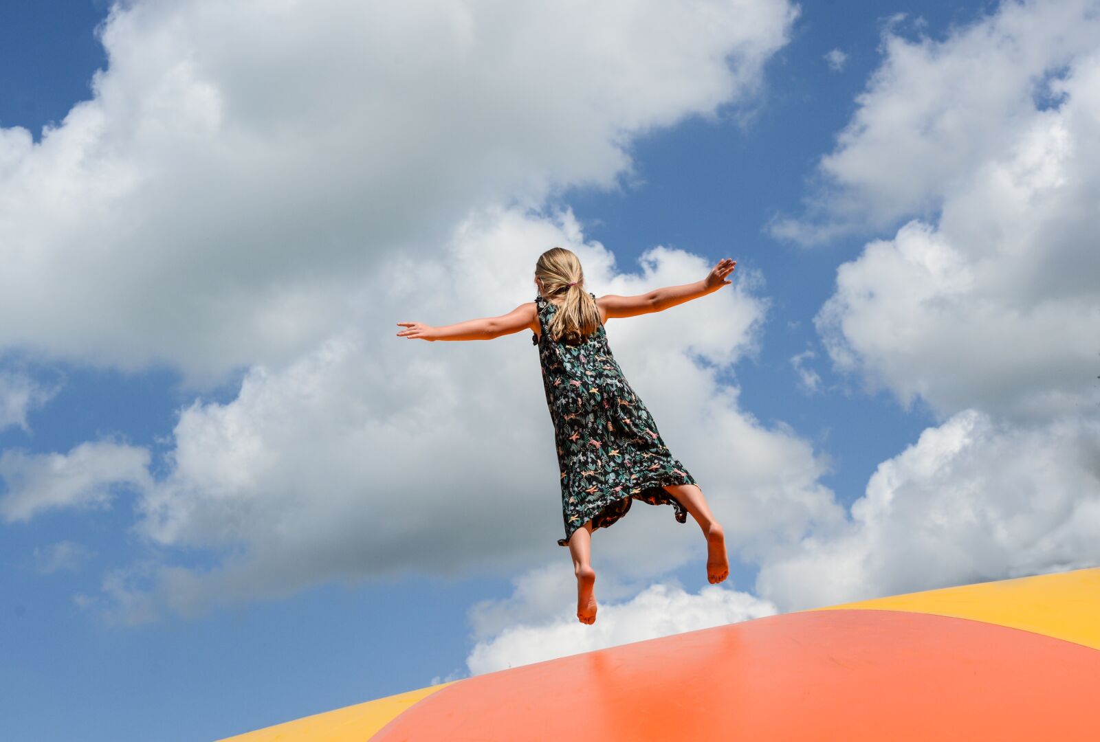 Nikon D610 sample photo. Girl, jumping, pillow photography