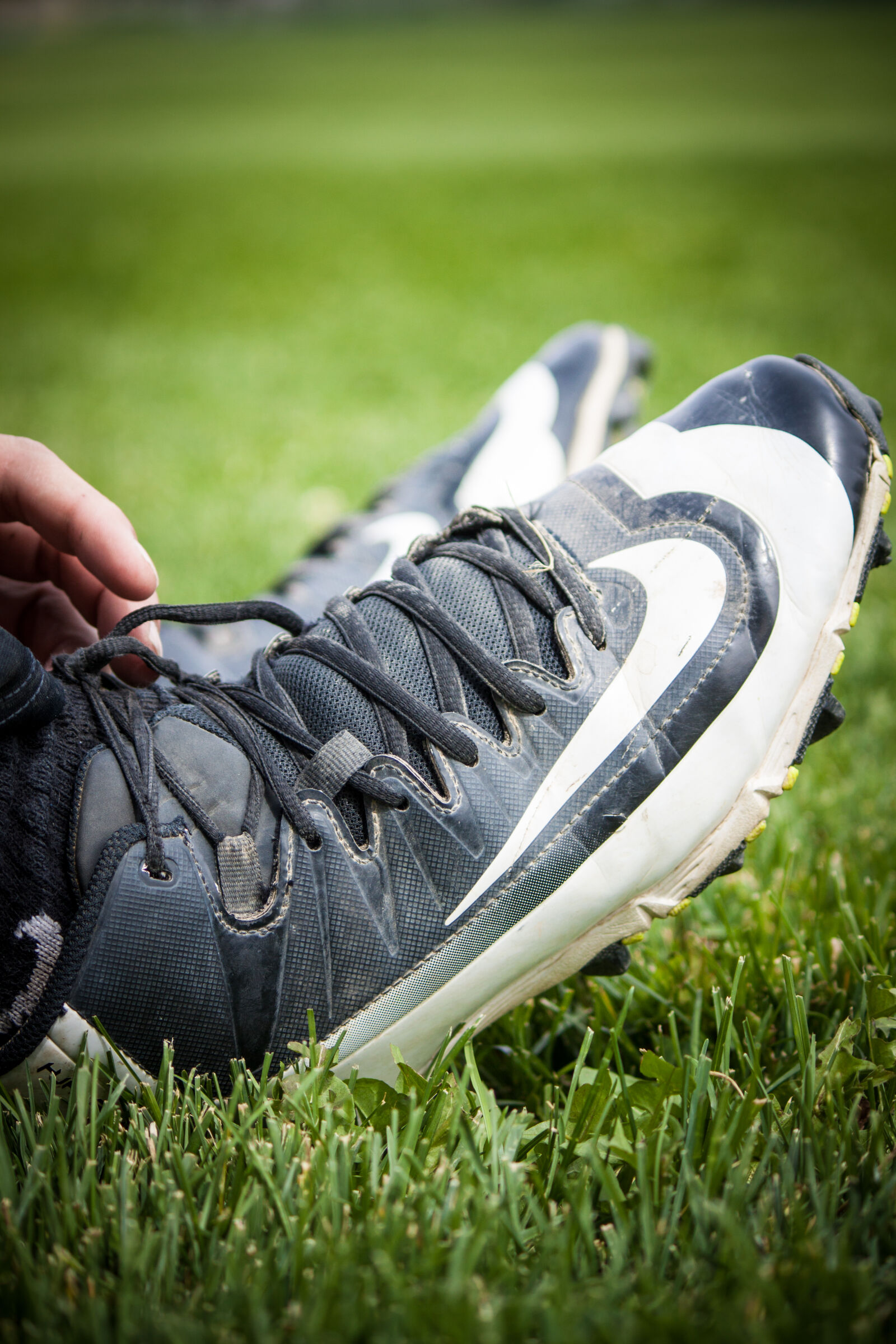 Canon EOS 50D + Canon EF-S 55-250mm F4-5.6 IS sample photo. Baseball, cleats, softball photography