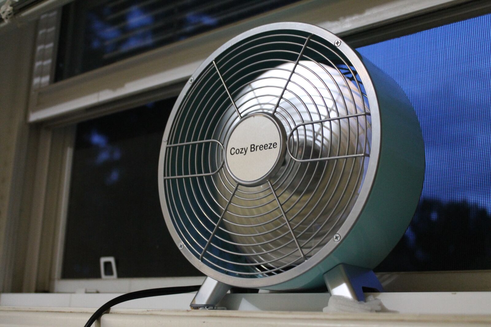 Canon EOS 1100D (EOS Rebel T3 / EOS Kiss X50) sample photo. Fan, window, evening photography