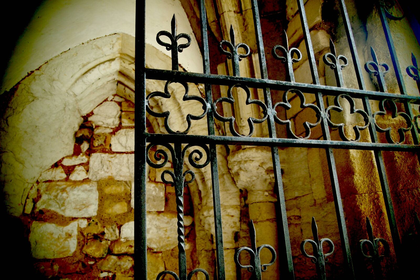 Olympus PEN E-PL1 sample photo. Arches, carved, stones, cathedral photography