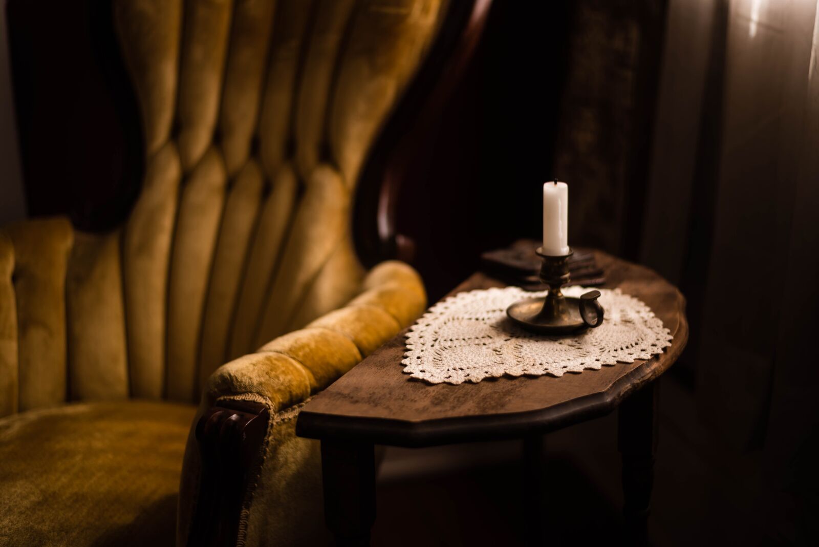 Nikon D750 sample photo. Chair, candlelight, dark room photography