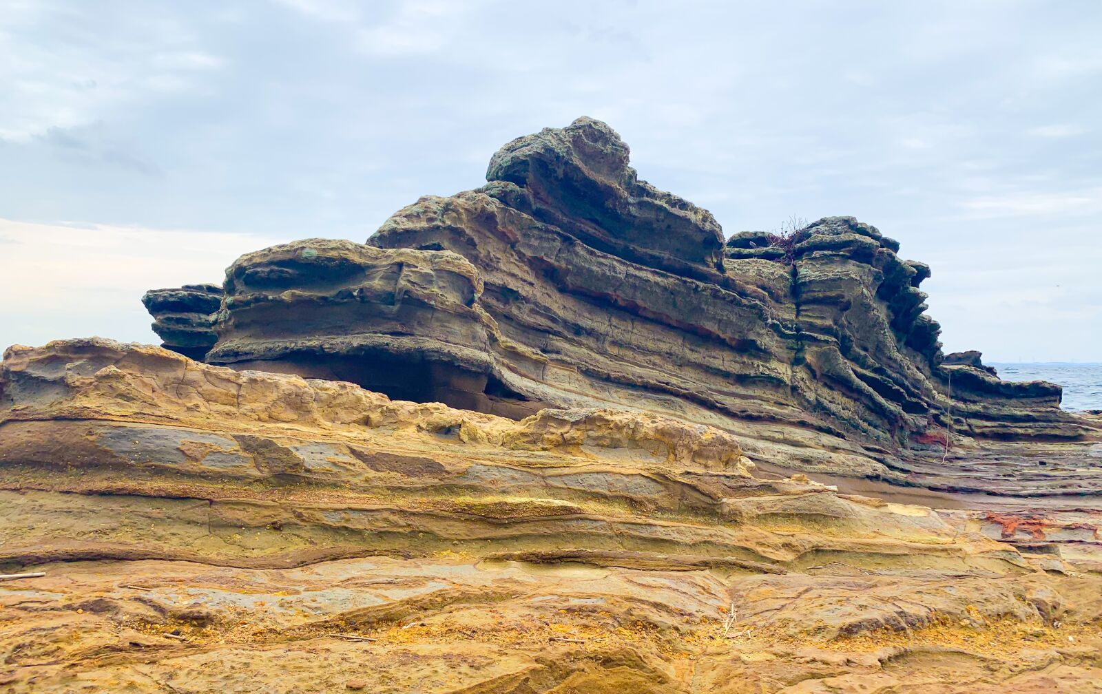 Apple iPhone XR sample photo. Strata, rock, sea photography