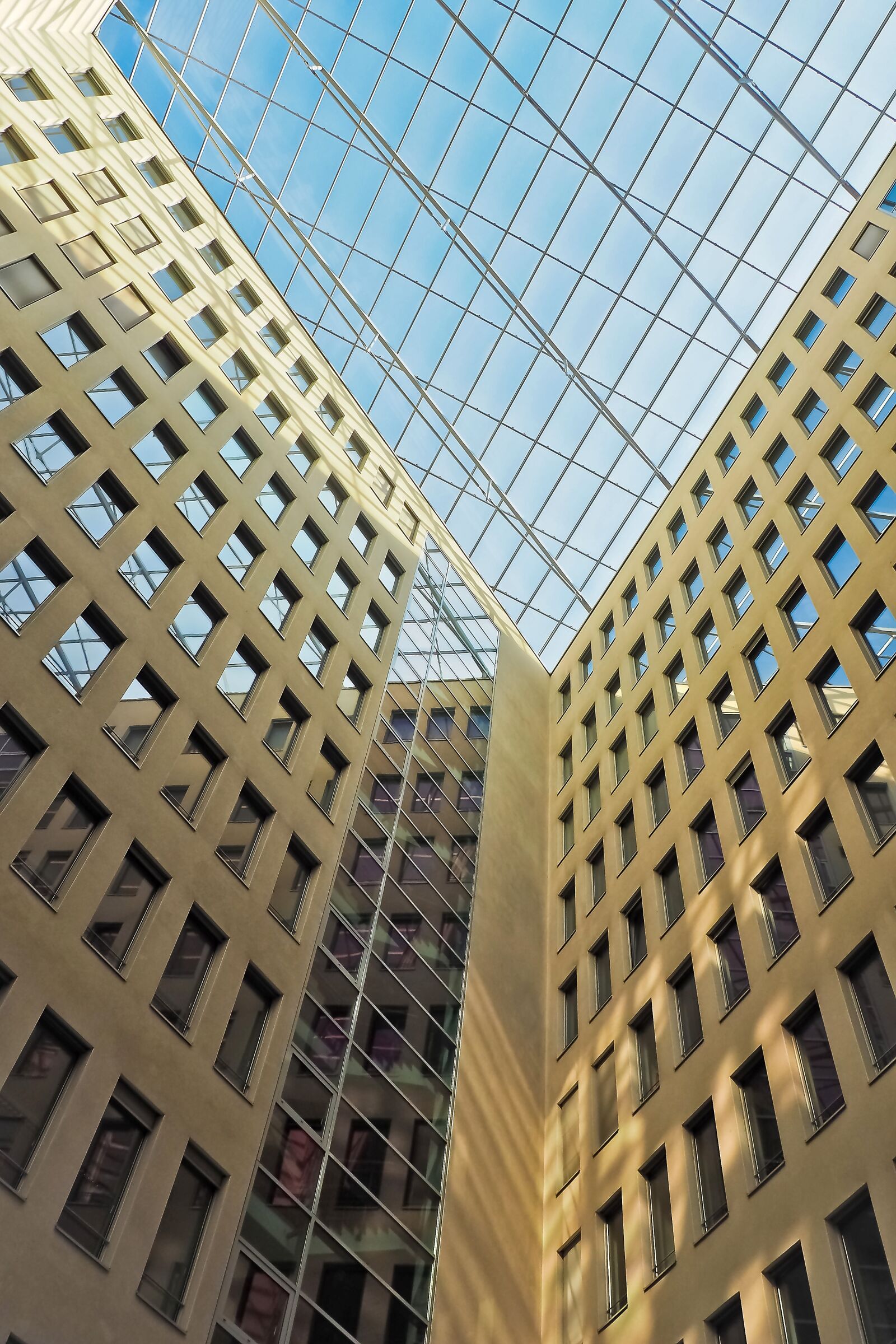 Olympus OM-D E-M10 sample photo. Architecture, skyscraper, glass facades photography