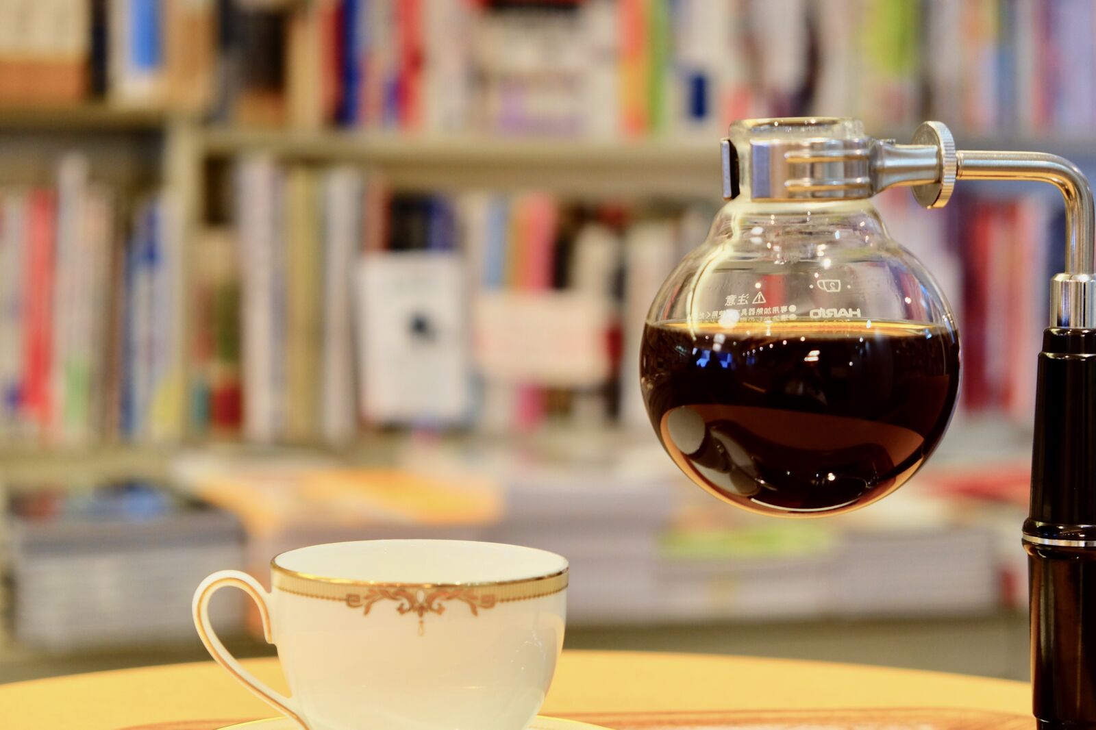 Fujifilm X-T10 sample photo. Siphon, coffee, books photography