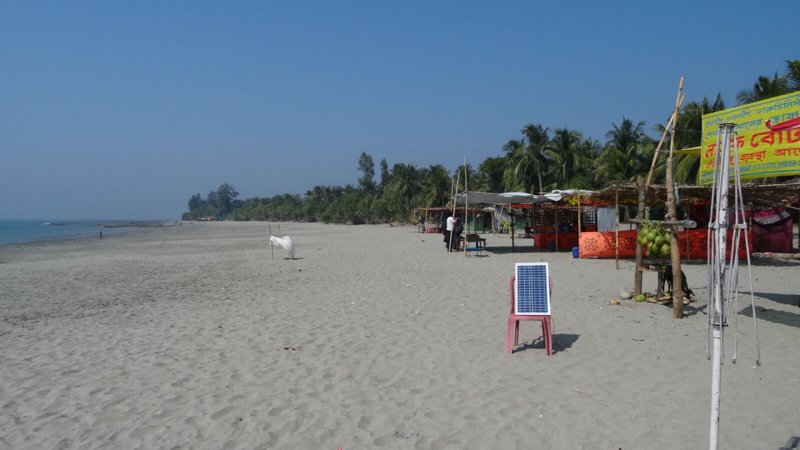 Sony Cyber-shot DSC-HX50V sample photo. Handcart, beach, seashore, sand photography