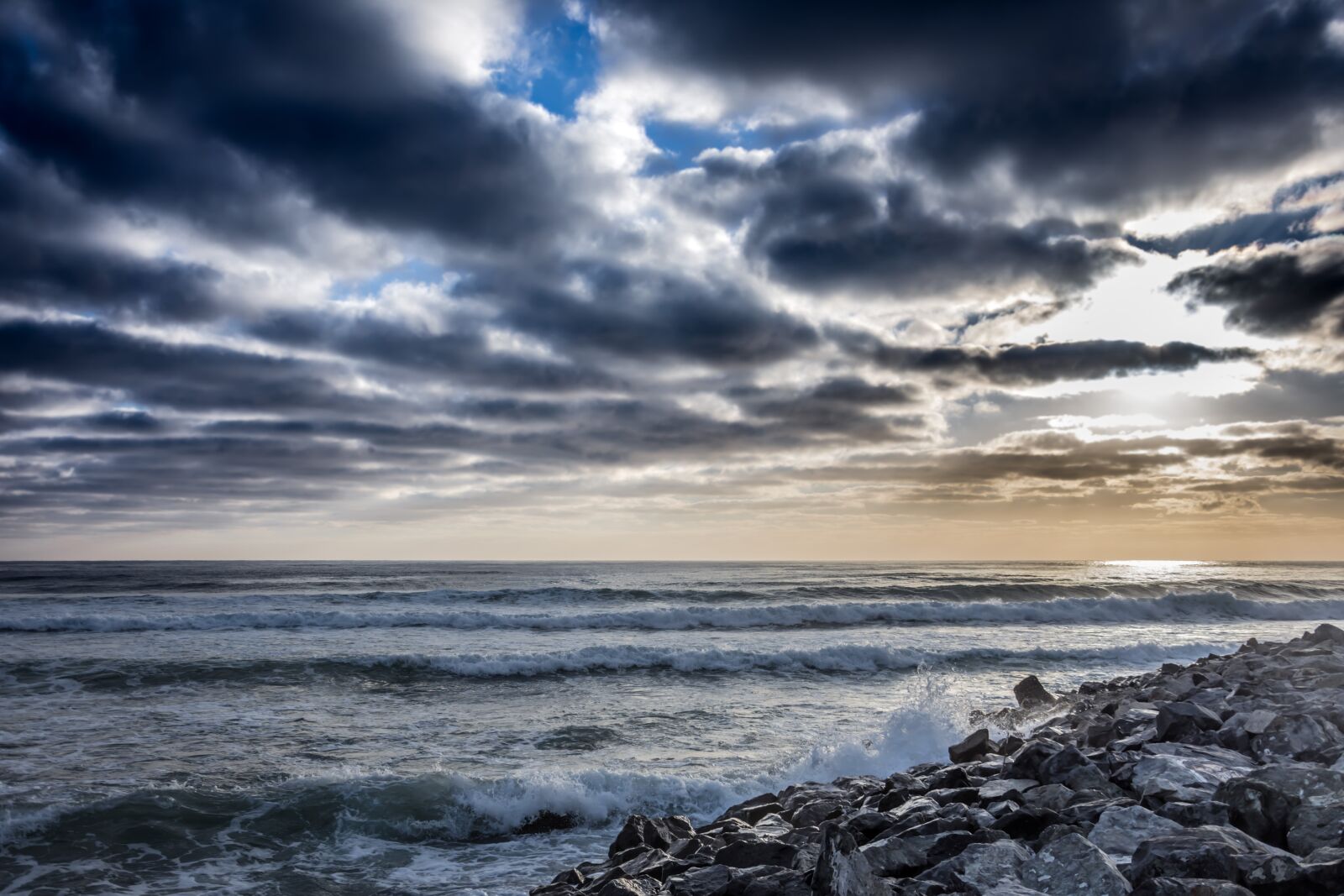 Nikon D7200 sample photo. Sunrise, beach, stones photography
