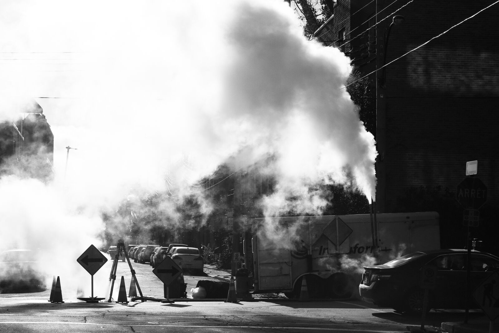 Canon EF 100mm F2.8 Macro USM sample photo. Construction, smoke, signs photography