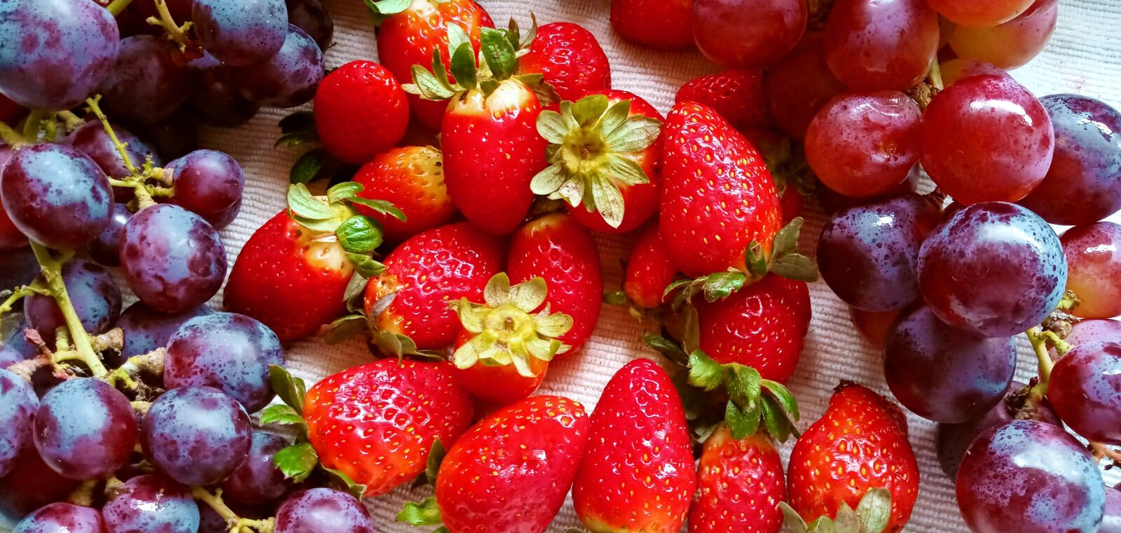 LG LM-X525 sample photo. Strawberries, grapes, fruit photography