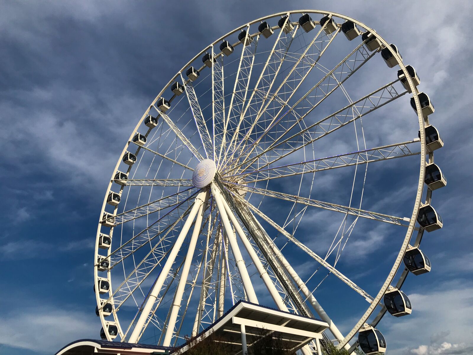 iPhone 7 back camera 3.99mm f/1.8 sample photo. Ferris wheel, carnival, sky photography