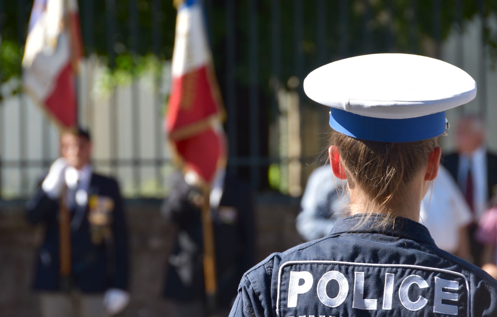 Nikon D5600 sample photo. Policeman, flag, police photography