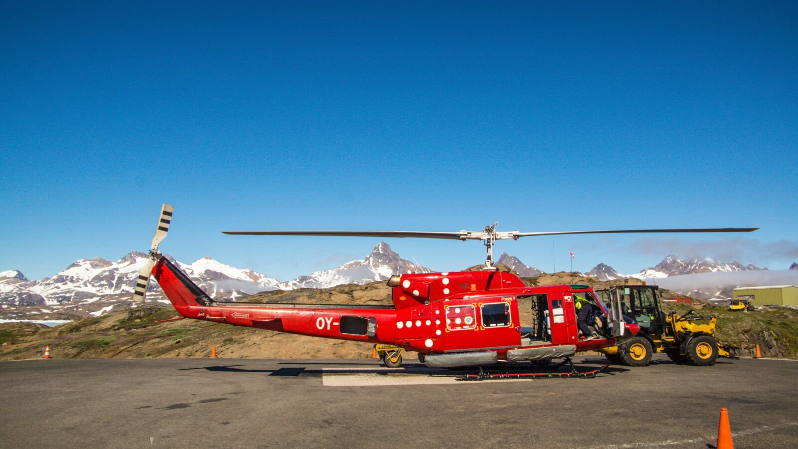 Tamron 16-300mm F3.5-6.3 Di II VC PZD Macro sample photo. Helicopter, red, helipad photography