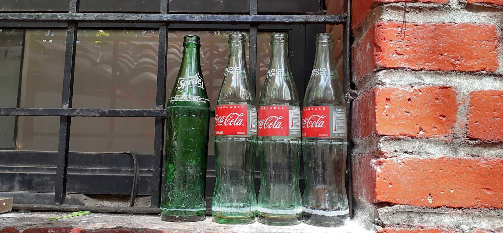 Samsung Galaxy A20 sample photo. Coke, brick, building photography