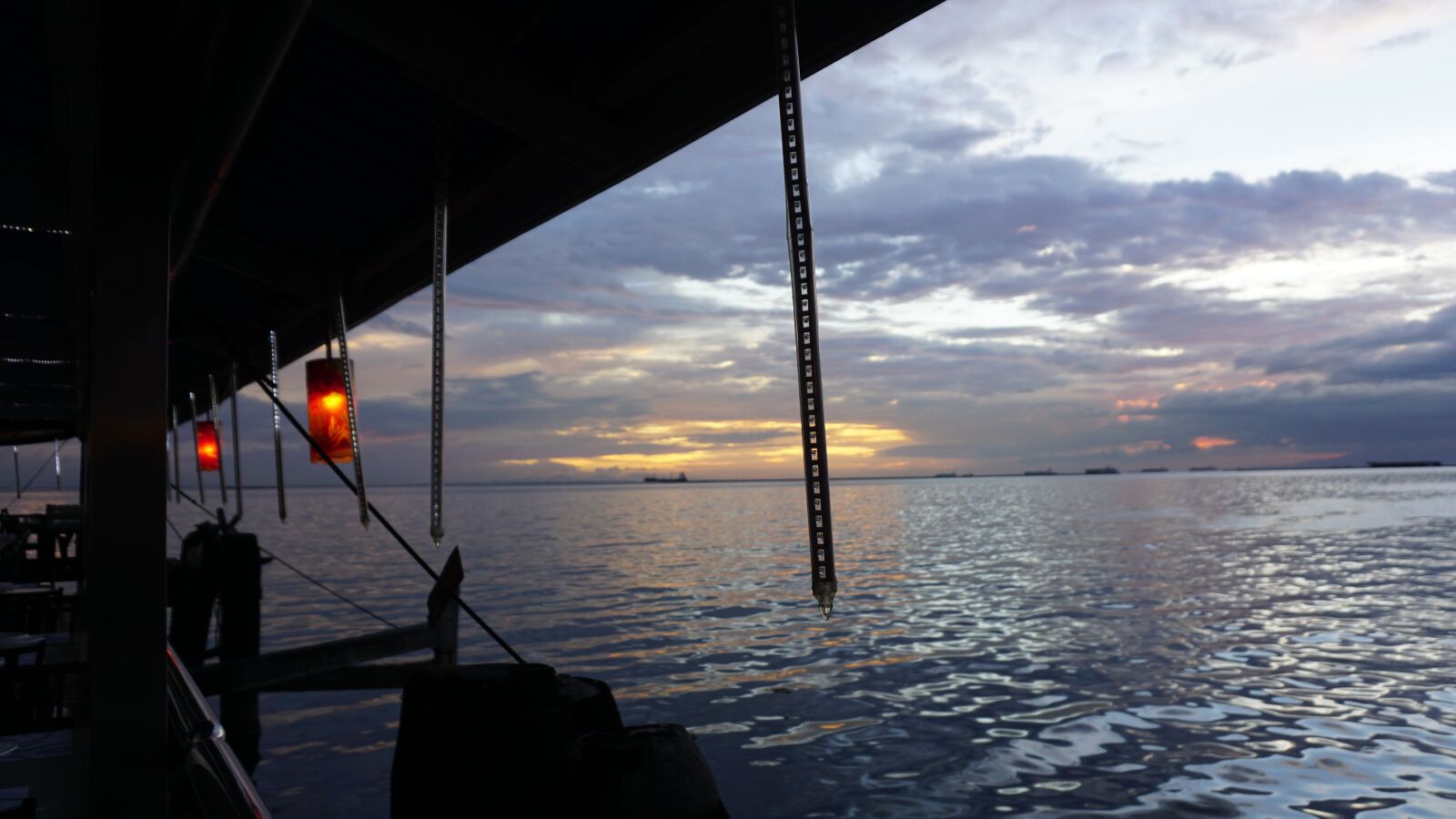 Sony a6000 sample photo. Sunset, tropical, restaurant photography