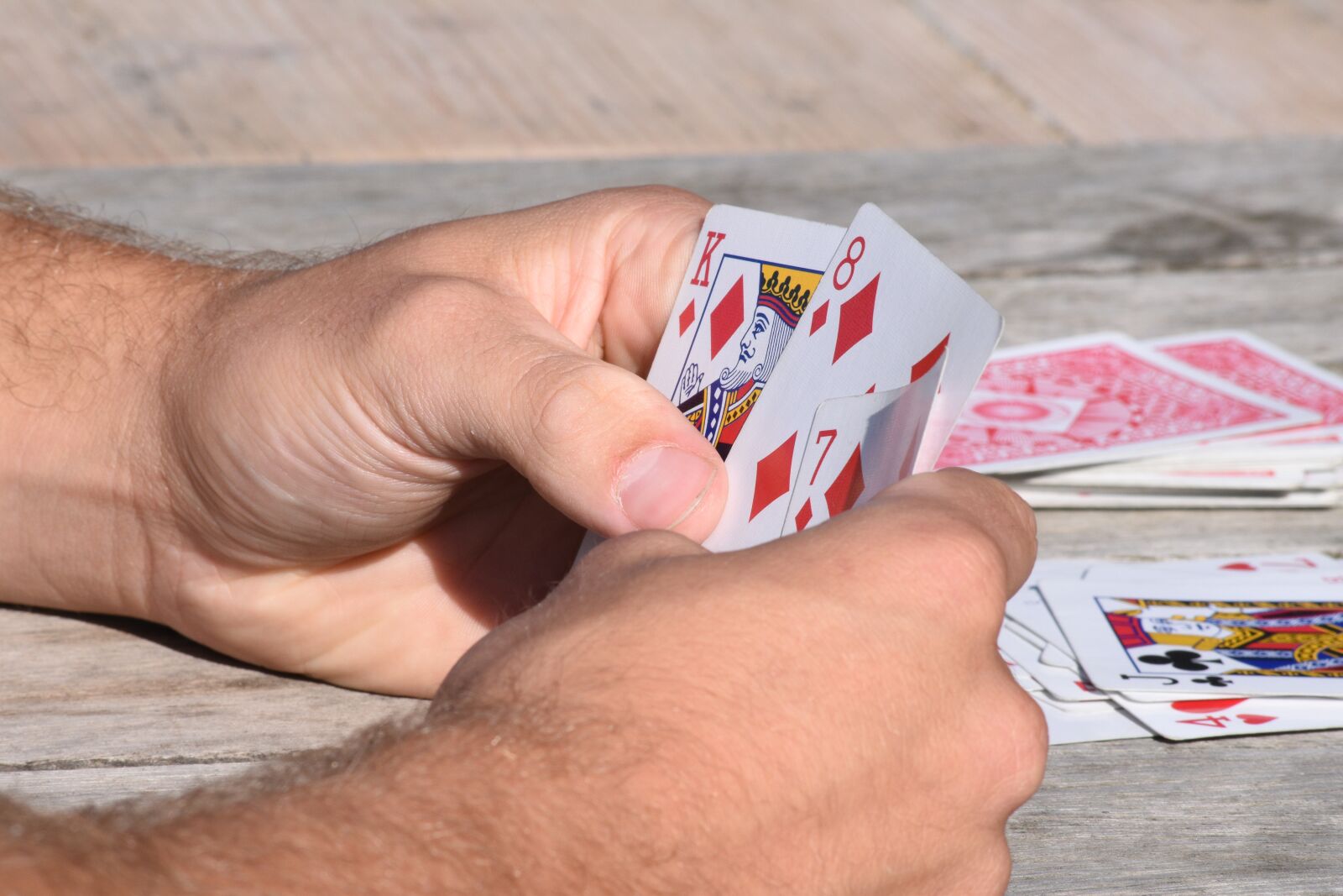 Nikon D5500 sample photo. Cards, hands, playing cards photography