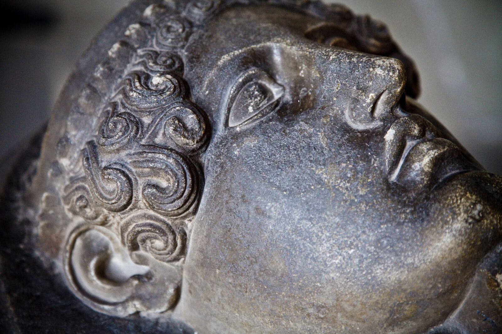Canon EOS 5D Mark II sample photo. Stone carving, face, archeology photography