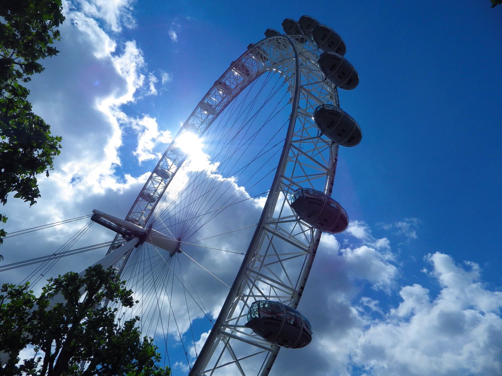 Pentax X-5 sample photo. The sun, clouds, architecture photography