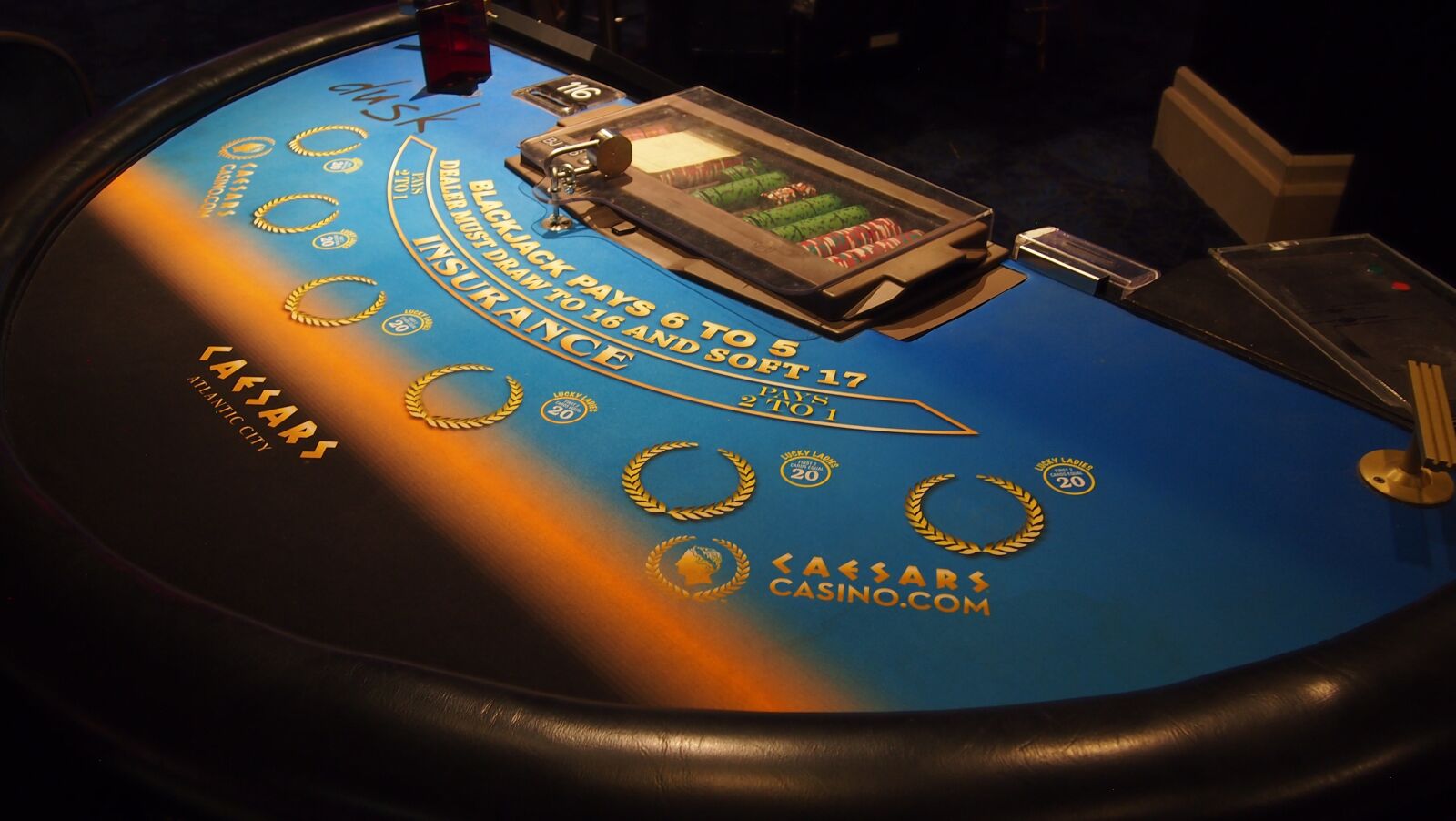 Olympus PEN E-PL3 sample photo. Casino, chips, poker face photography