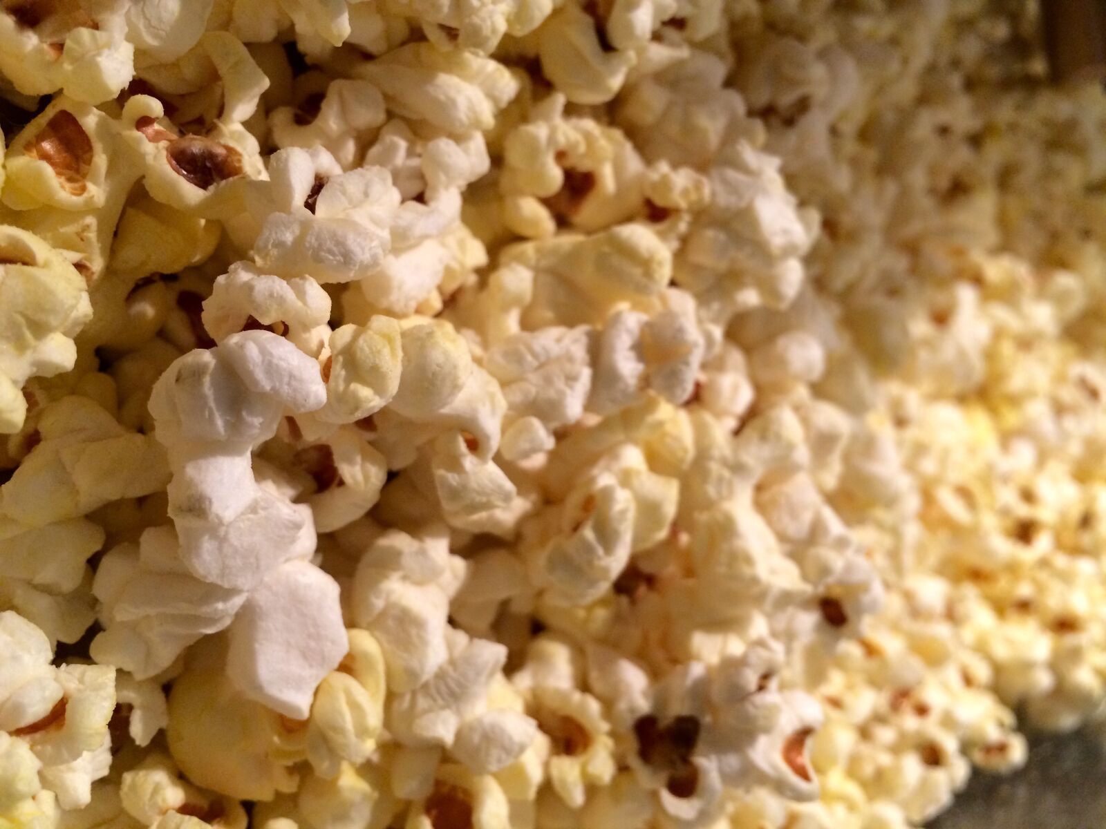 iPhone 5s back camera 4.15mm f/2.2 sample photo. Cinema, movie, night, popcorn photography