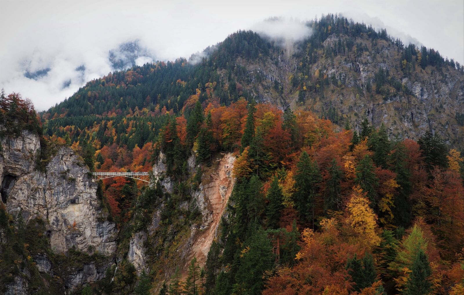 Olympus OM-D E-M10 sample photo. Bridge, fog, mountain photography