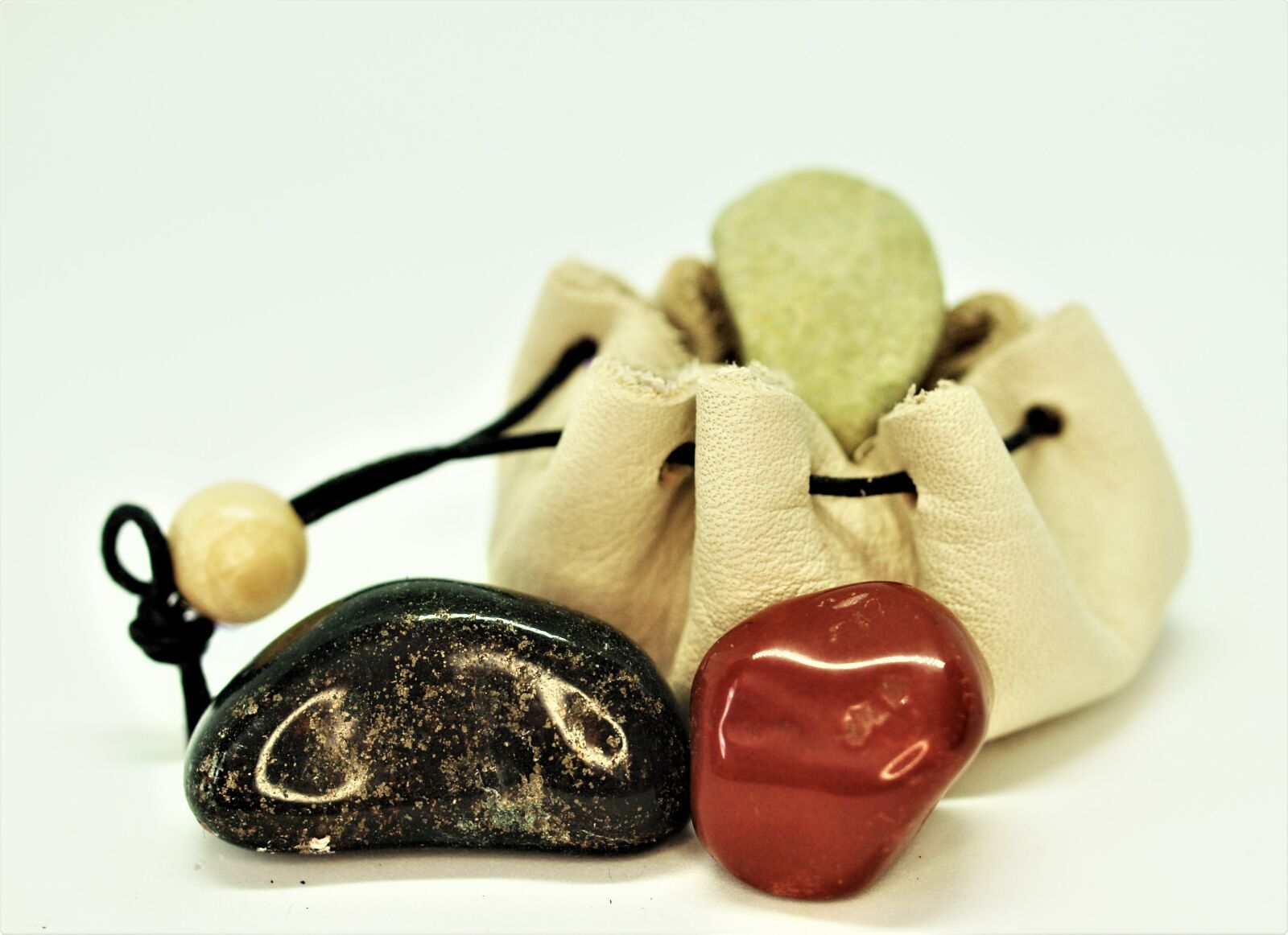 Olympus E-520 (EVOLT E-520) sample photo. Stones, bag, natural healing photography