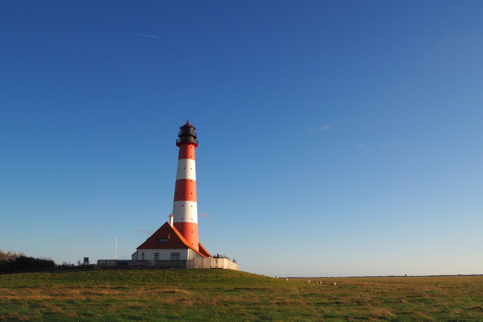 Olympus OM-D E-M10 sample photo. Lighthouse, westerhever, nordfriesland photography