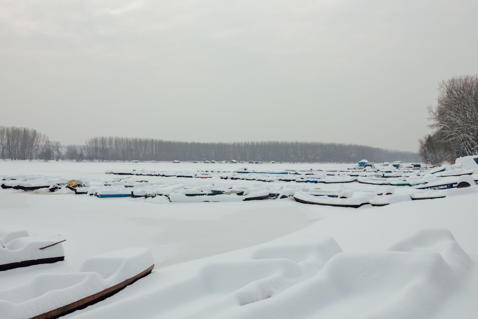 Canon EF-S 18-55mm F3.5-5.6 IS sample photo. Snowy, frozen, boats, cold photography
