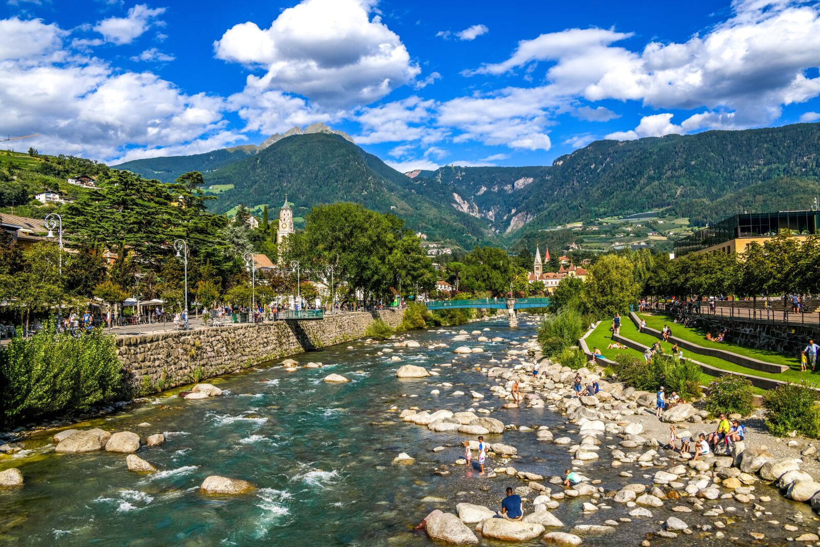 Tamron 28-300mm F3.5-6.3 Di VC PZD sample photo. River, city, mountains photography