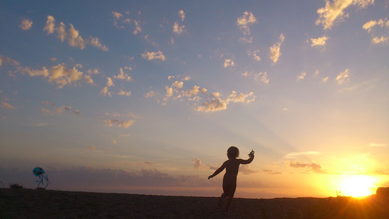 Sony Ericsson Xperia Arc sample photo. Child, sunset, children's games photography