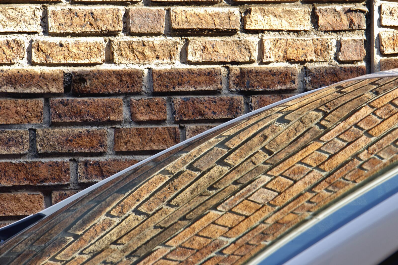 Canon EOS 550D (EOS Rebel T2i / EOS Kiss X4) sample photo. Windshield, wall, brick, glass photography