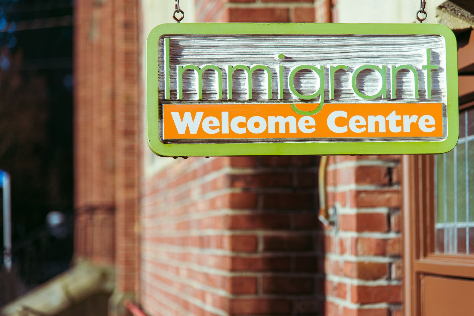 Nikon D750 sample photo. Immigrant, welcome, centre photography