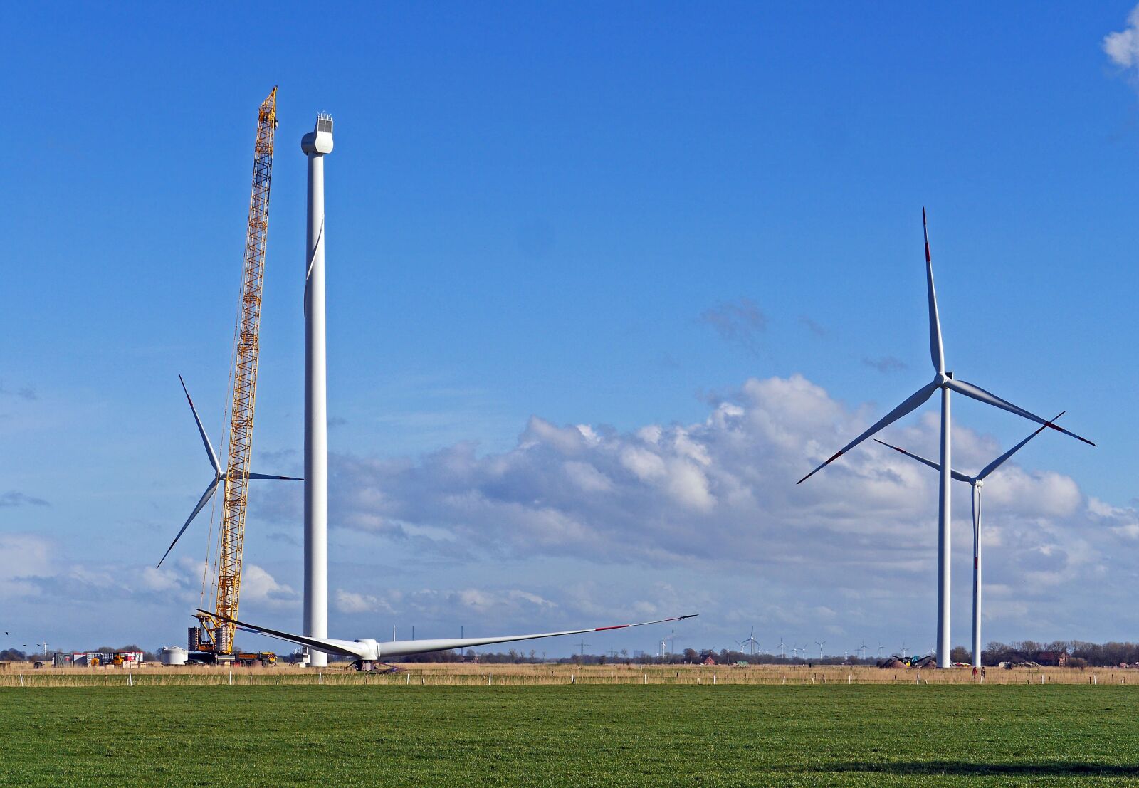 Panasonic Lumix DMC-GH3 sample photo. Wind power, pinwheel, building photography