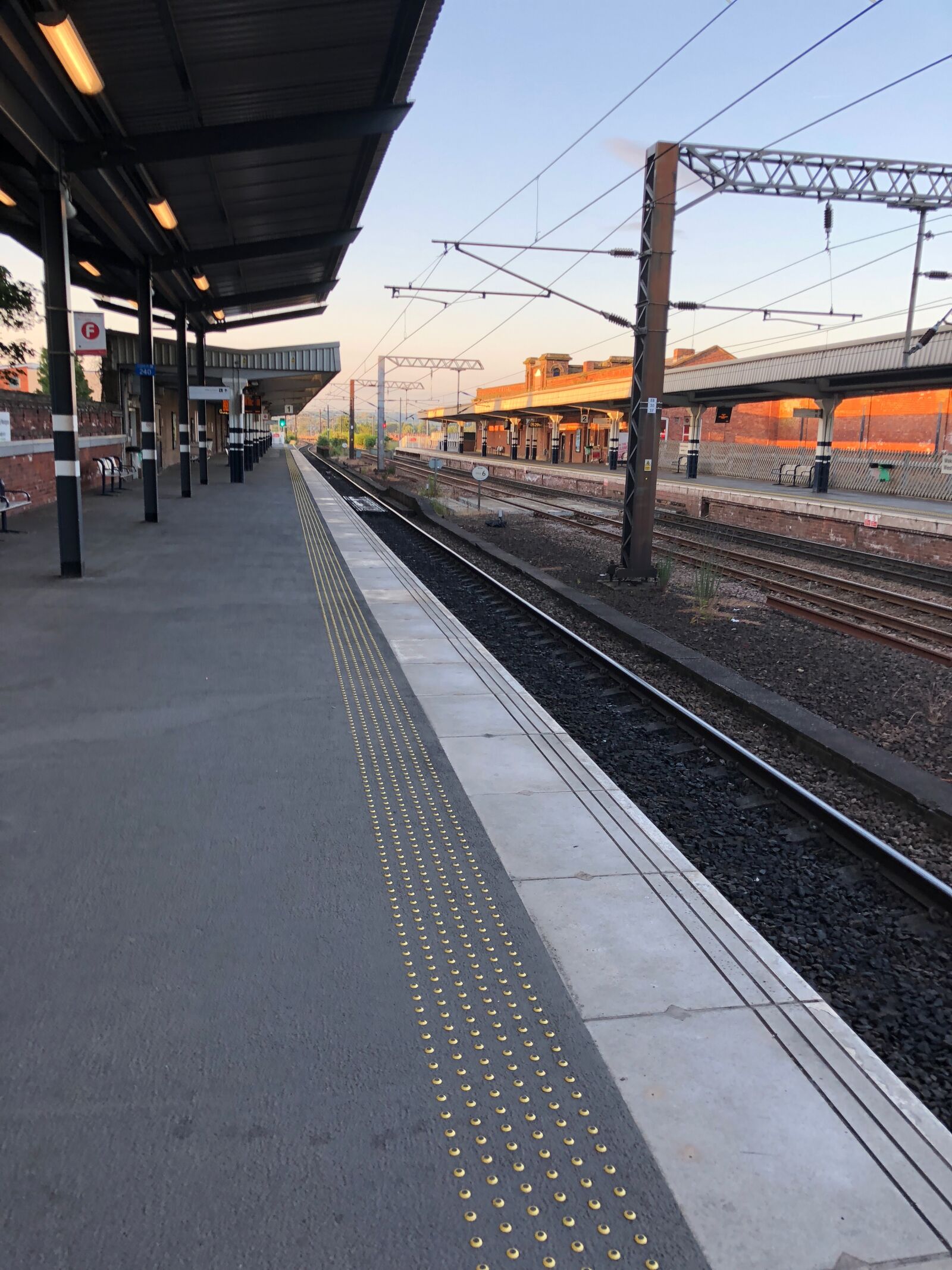 iPhone 8 back camera 3.99mm f/1.8 sample photo. Train, station, railway photography