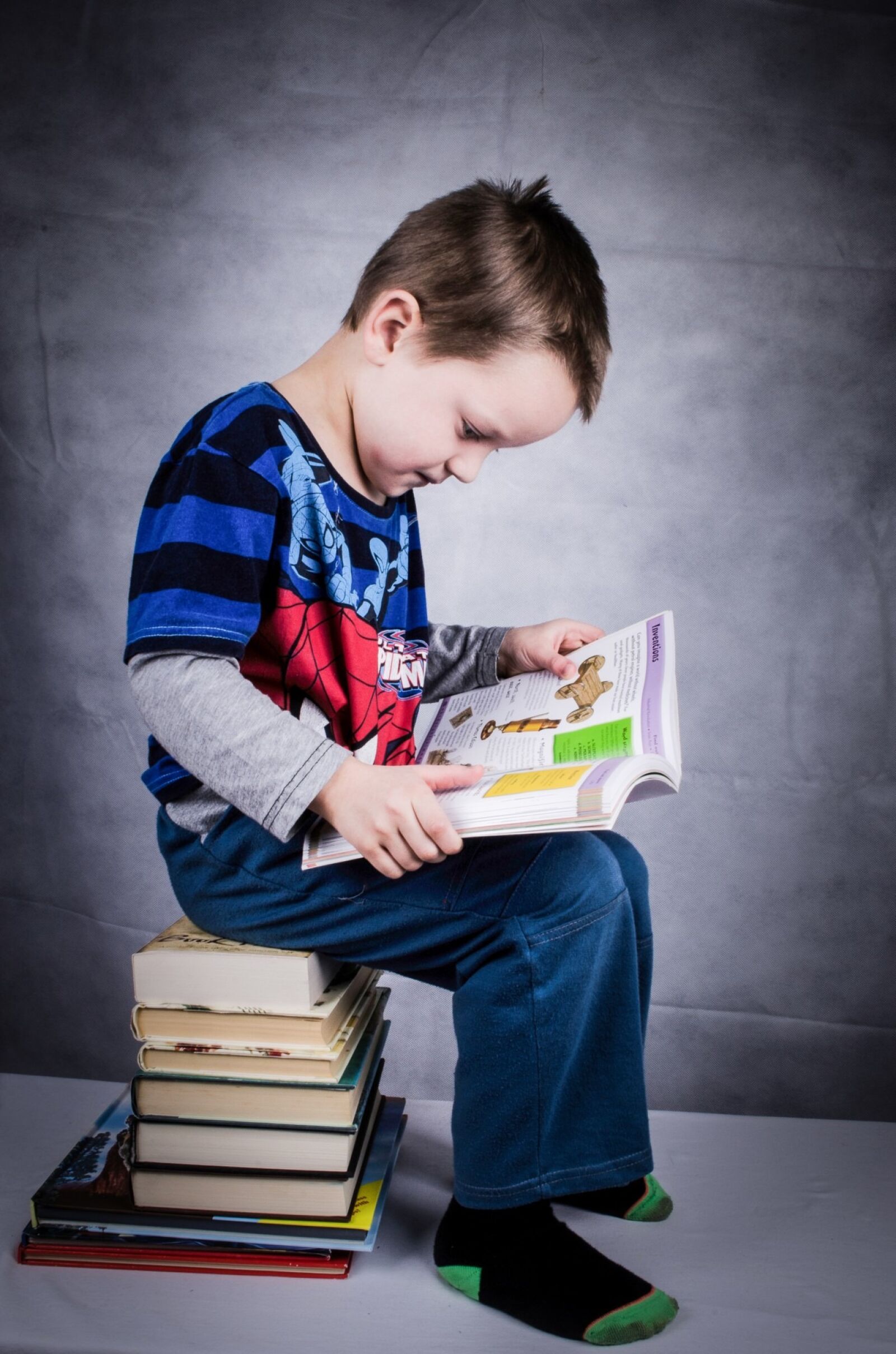 Nikon D5100 sample photo. Book, boy, child, classroom photography