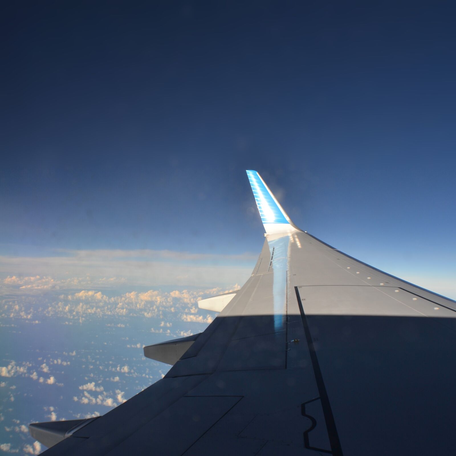 Nikon D3100 sample photo. Above, clouds, flying, plane photography