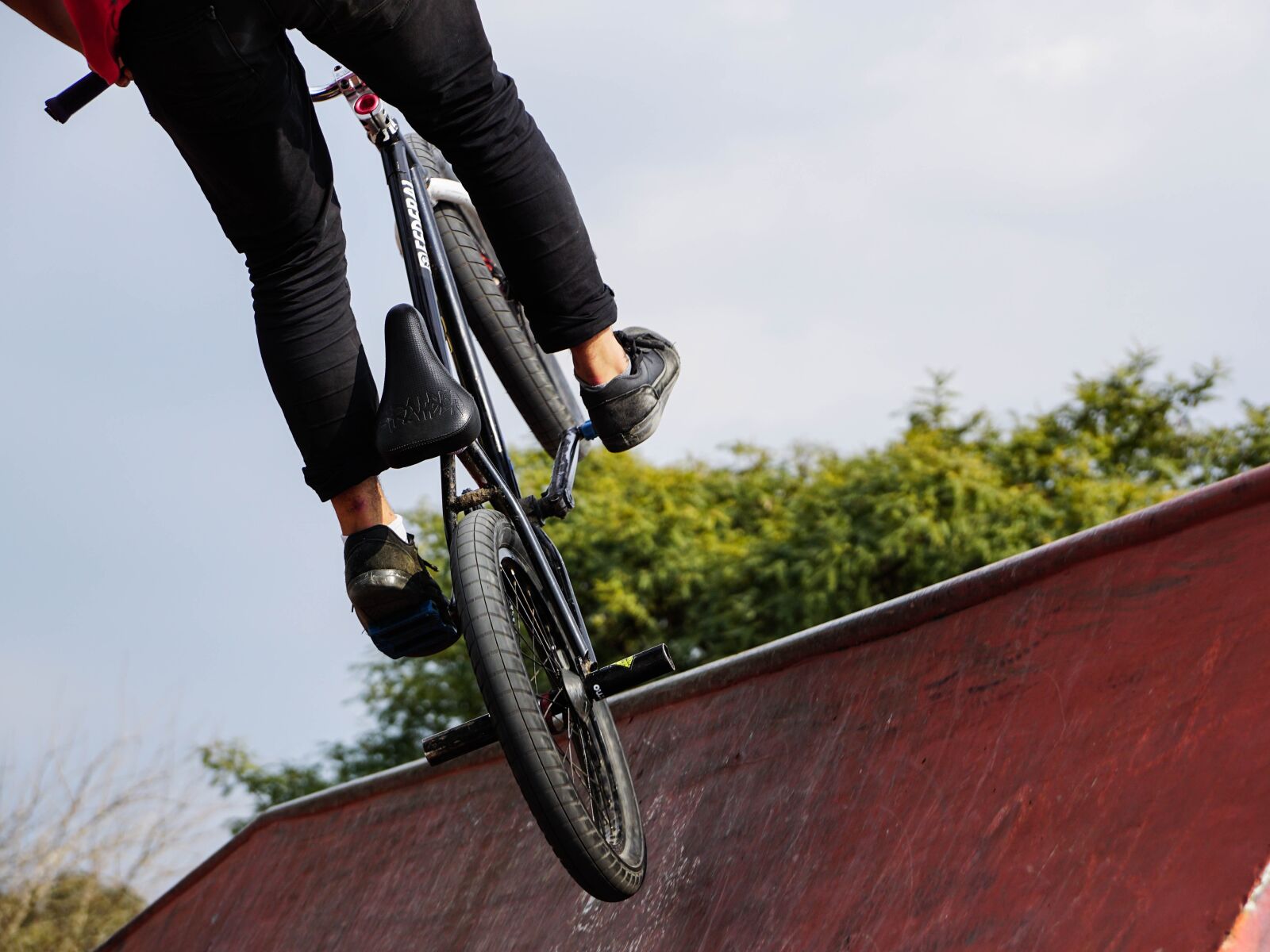 Sony DT 18-135mm F3.5-5.6 SAM sample photo. Bicycle wheels, jump the photography