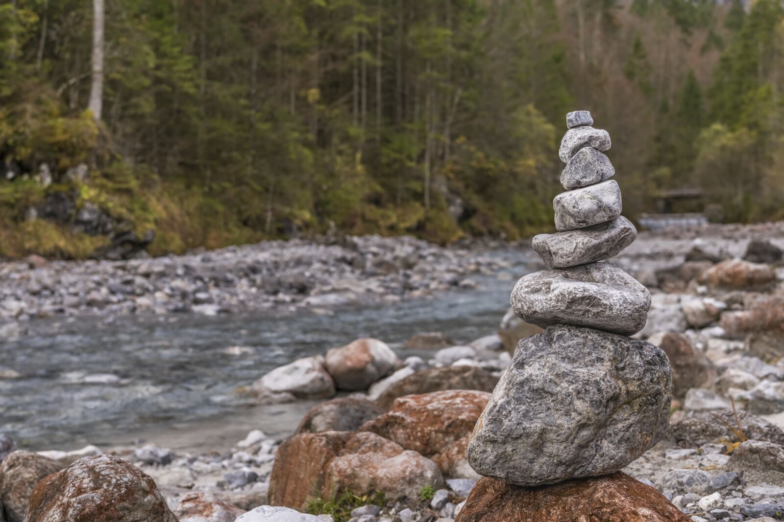 Sony a6300 sample photo. Cairn, river, stones photography