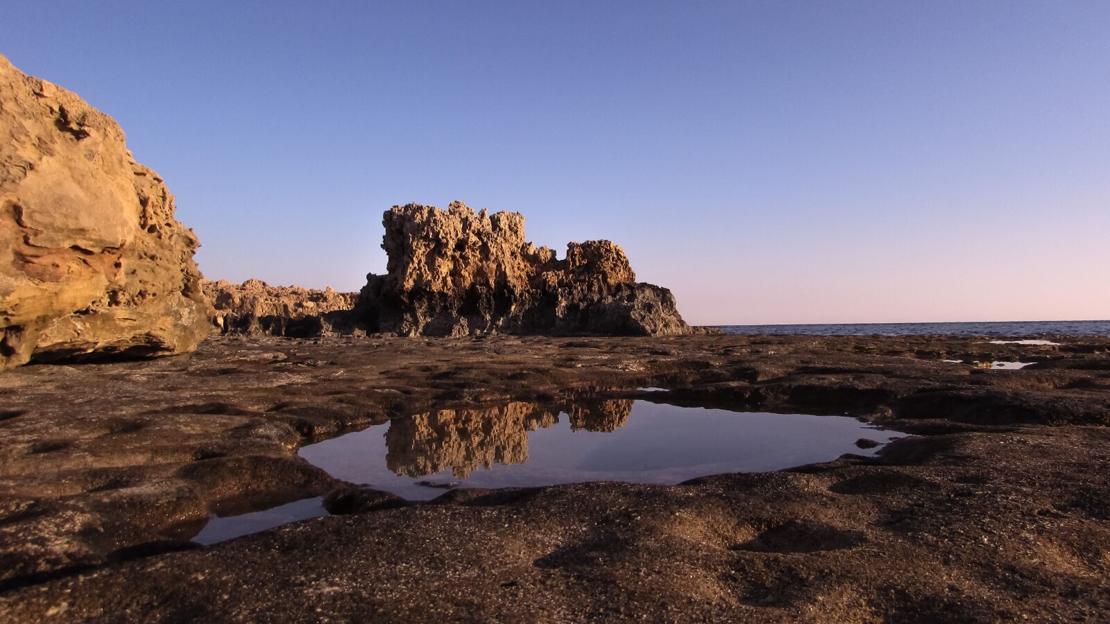 Canon PowerShot SX400 IS sample photo. Rock, water, reflection photography