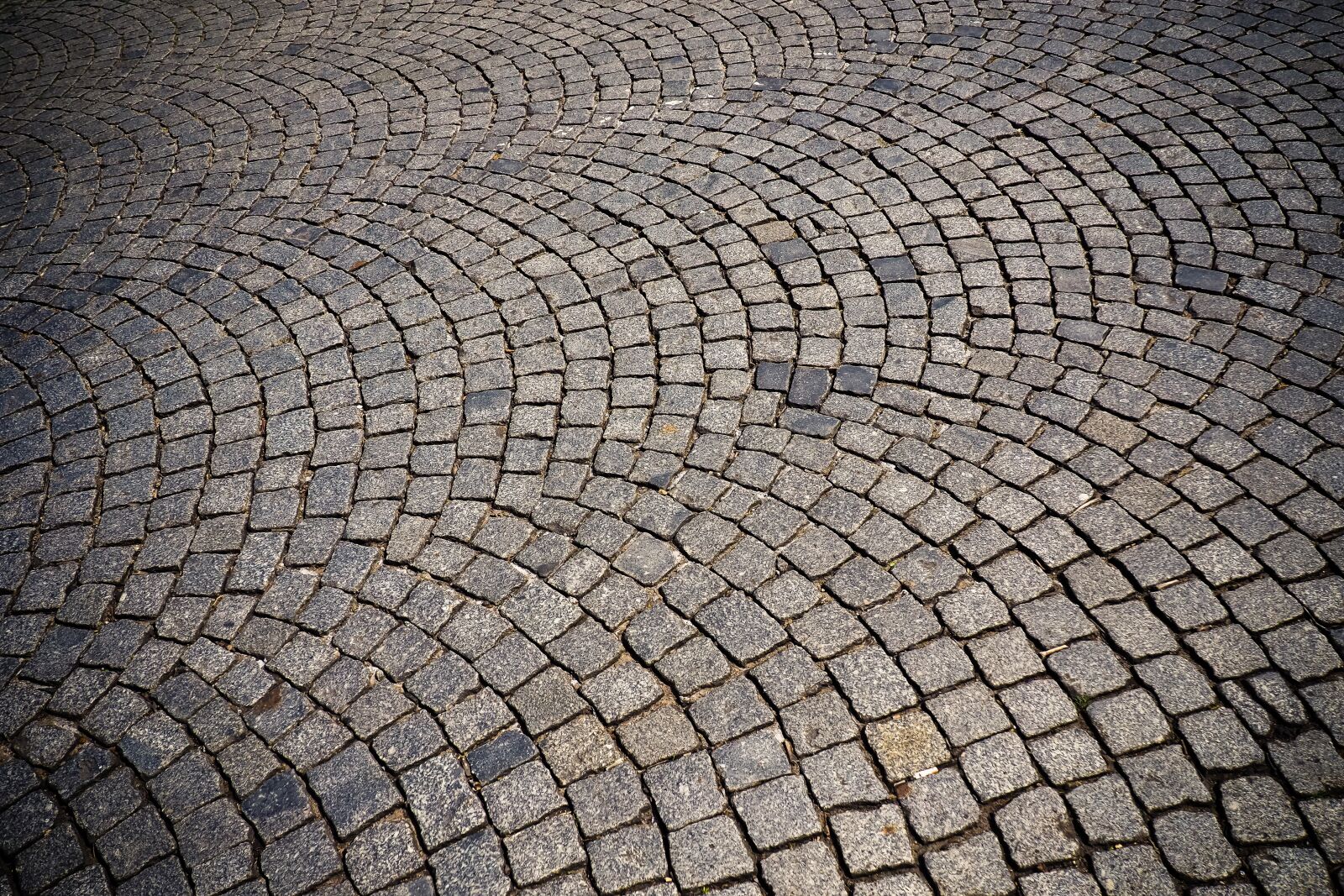 Olympus OM-D E-M10 sample photo. Cobblestone, patch, road photography