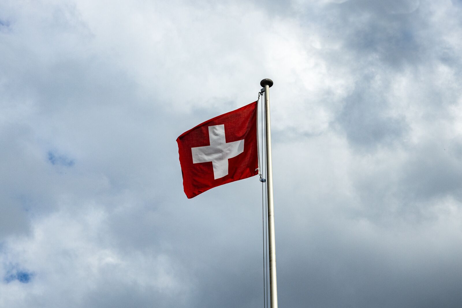 Canon EOS R sample photo. Flag, wind, switzerland photography