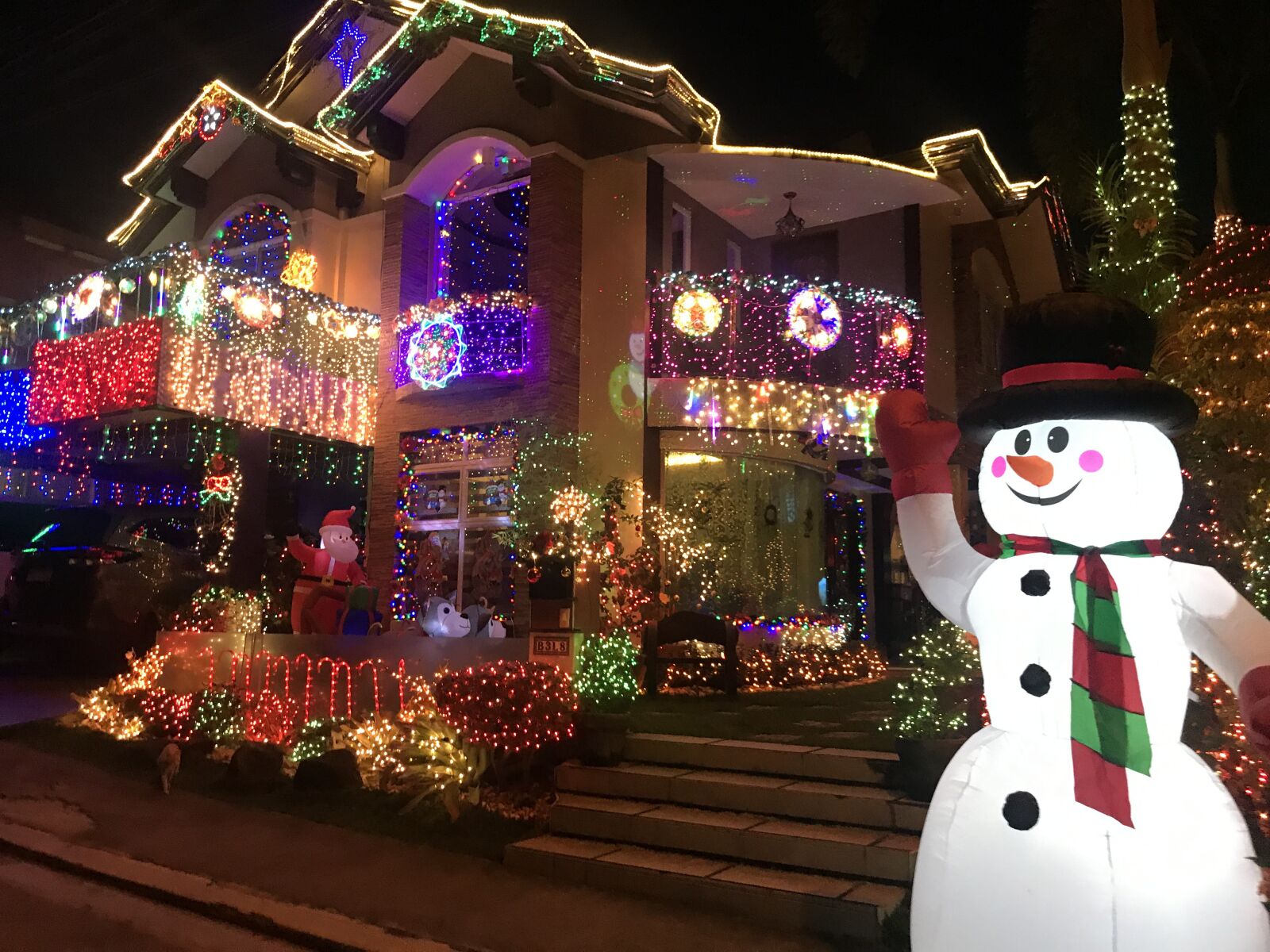 Apple iPhone 7 Plus sample photo. Christmas lights, snowman, winter photography