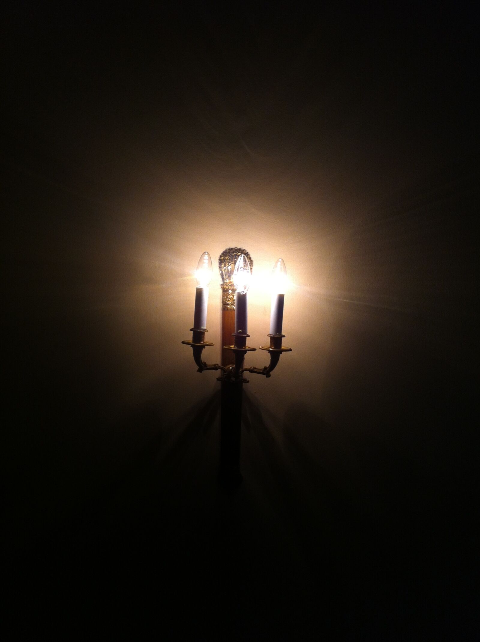 Apple iPhone 4 sample photo. Candlestick, dark, illuminate, lamp photography