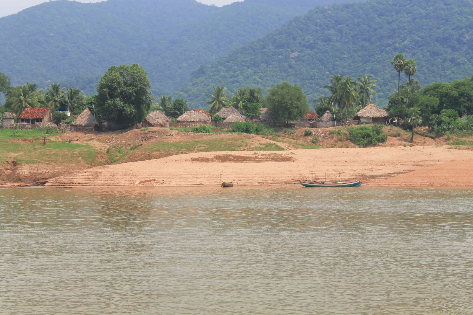 Canon EOS 1100D (EOS Rebel T3 / EOS Kiss X50) sample photo. Water, boat, village photography
