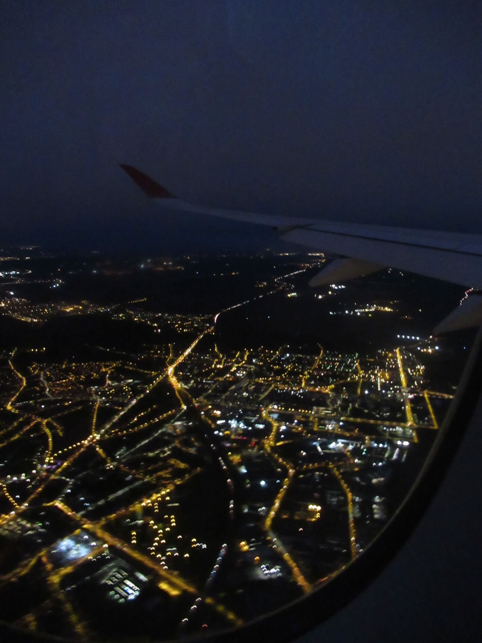 Canon PowerShot SX620 HS sample photo. Night, flight, wing photography