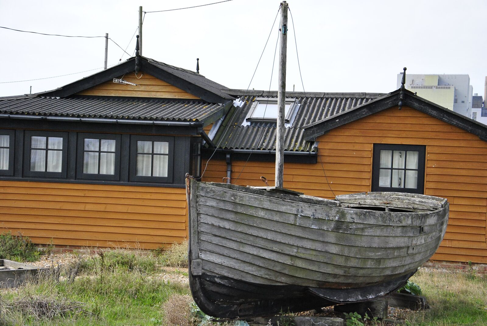 Nikon D3000 sample photo. Seashore, boat, landscape photography