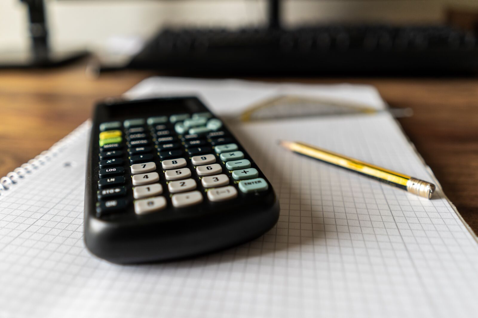 Sony a7 + Sony FE 28mm F2 sample photo. Calculator, gtr, pen photography