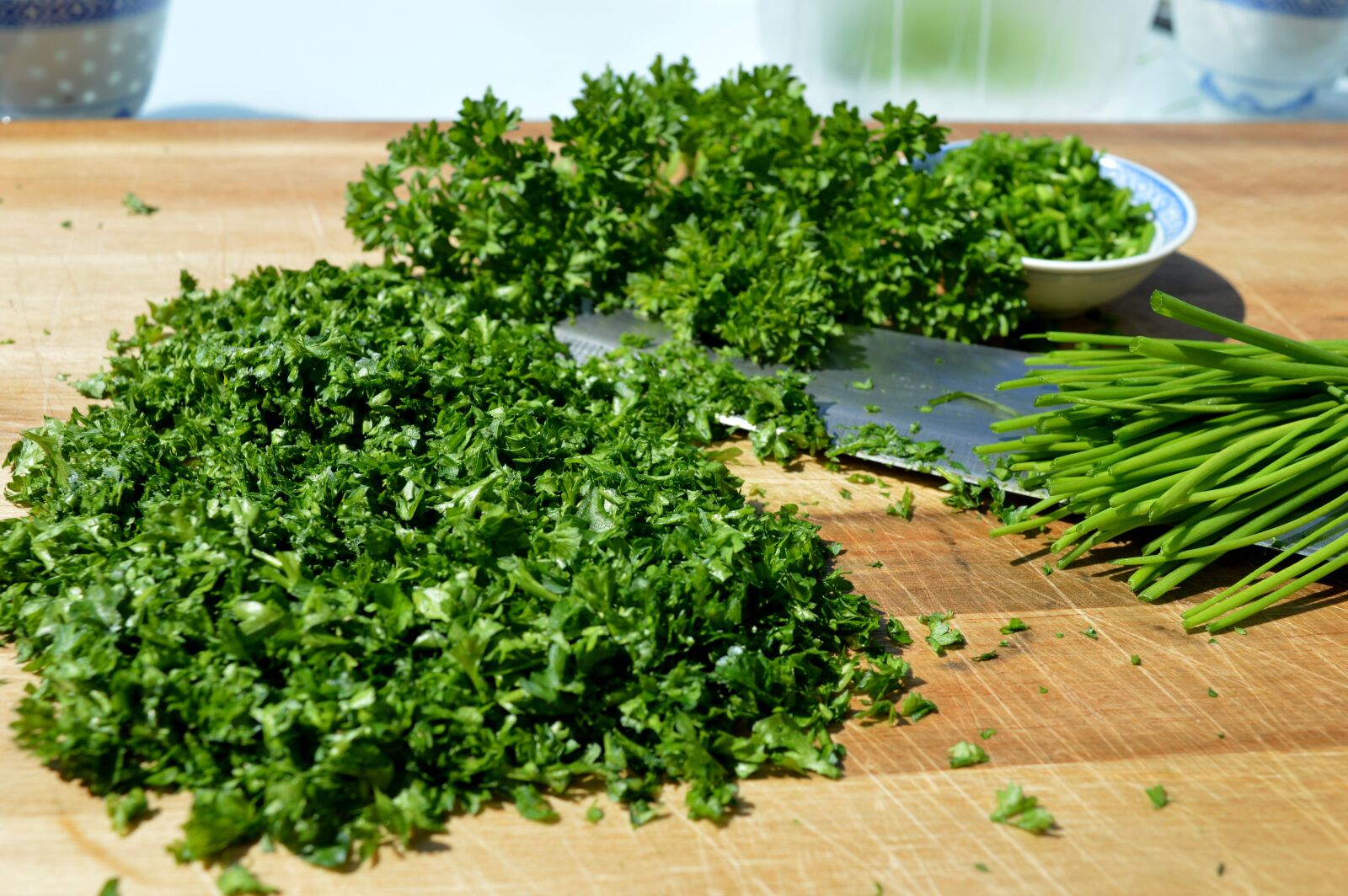 Nikon D3200 sample photo. Herbs, cutting board, knife photography